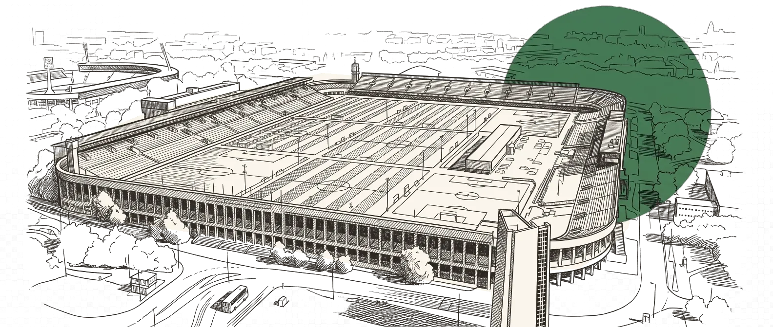 Vue aérienne du stade Strahov : la longue tribune à colonnades, les terrains d'entraînement à l'intérieur de l'enceinte et la ville au fond.